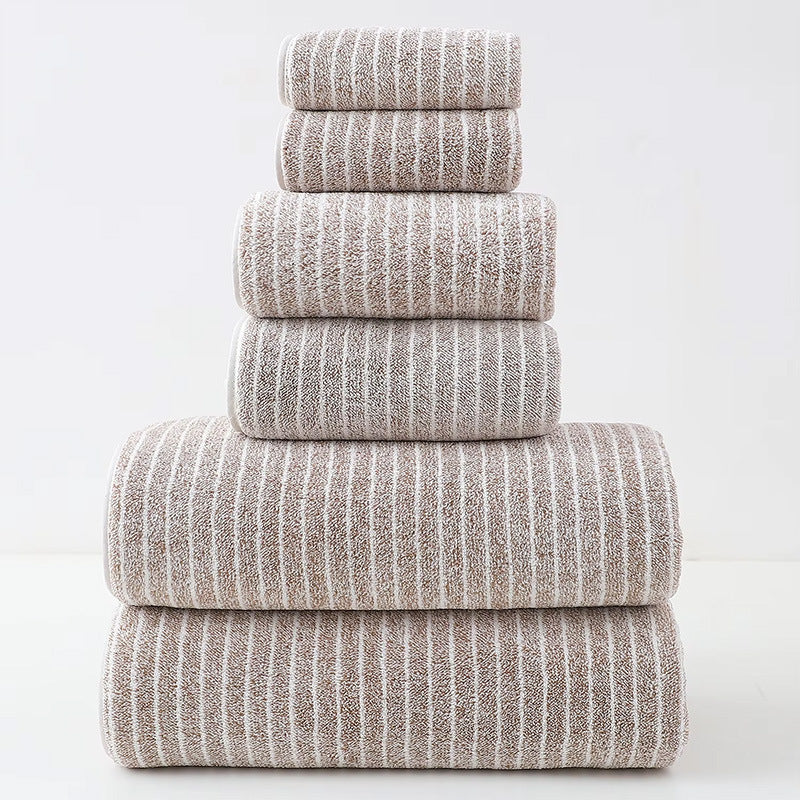 Stack of five striped towels on a white background
