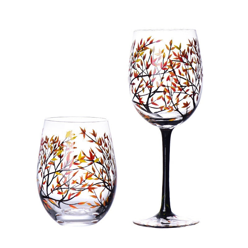 Hand-painted crystal glass wine goblet with four seasons design on clear crystal