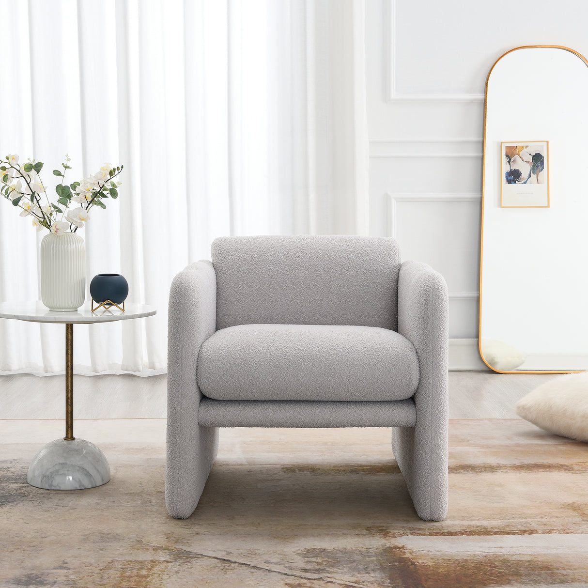 Armchair with wavy armrests, metal decorations on both sides of the armrests, made of Teddy cloth, light gray - Julia M LifeStyles