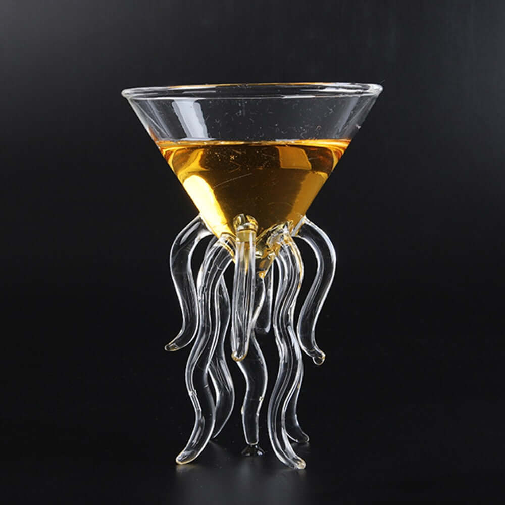 Octopus Cocktail Glass Transparent Jellyfish Glass Cup Juice Glass Goblet Conical Wine Champagne Glass filled with drink.