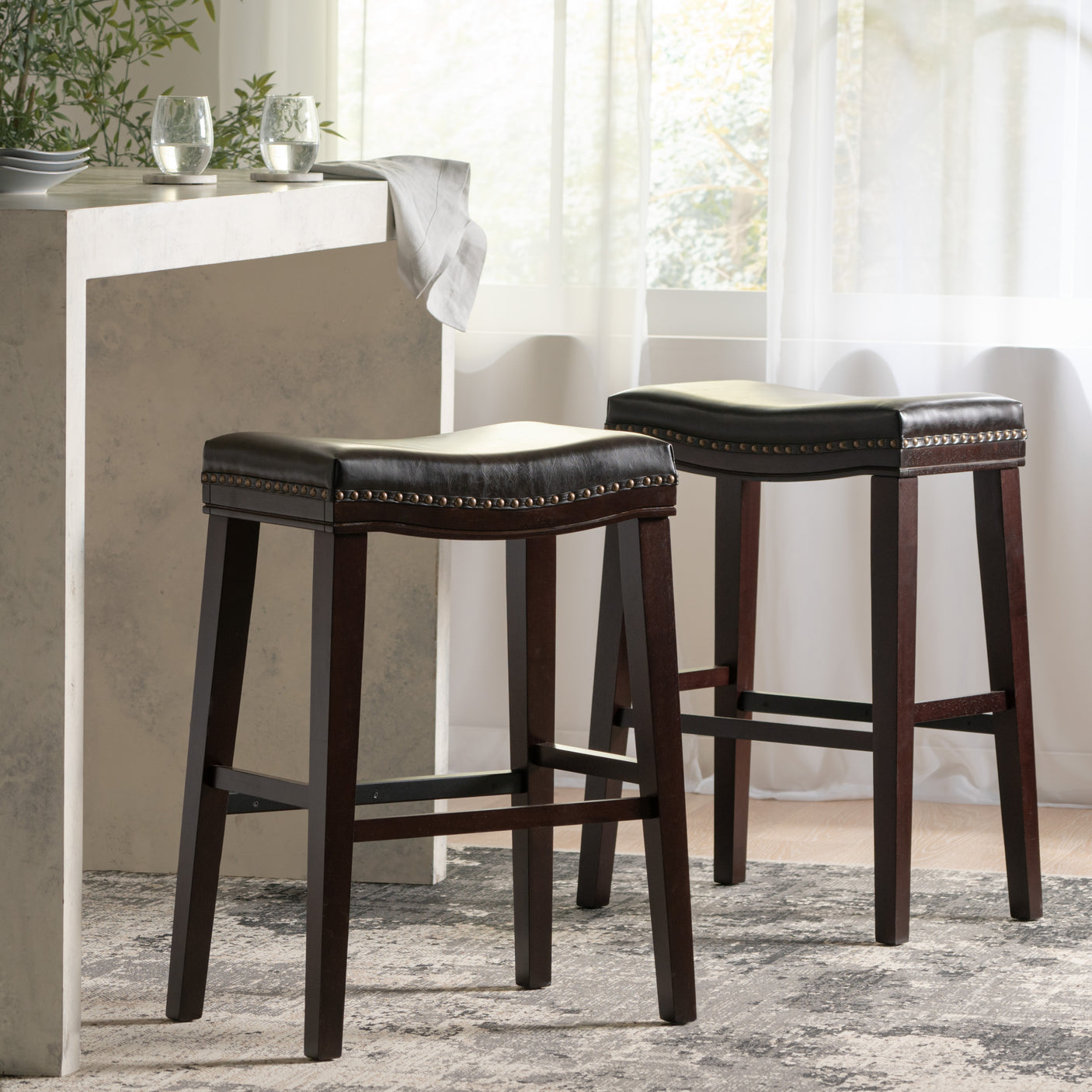 SADDLE STOOL - Julia M LifeStyles