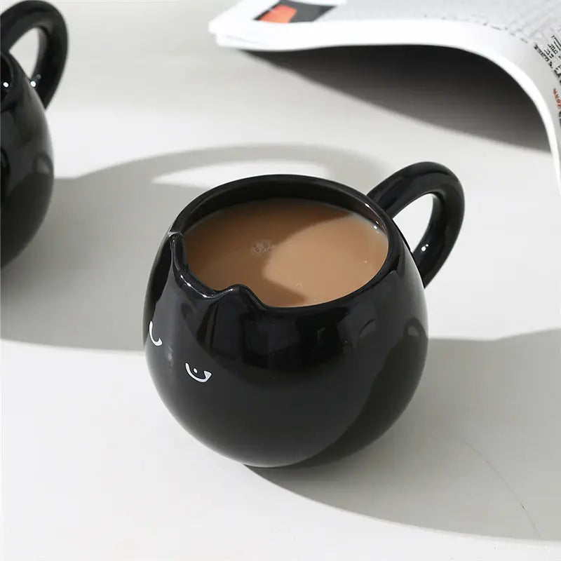 Adorable hand - painted cat - shaped ceramic mug, perfect for coffee or tea. - Julia M LifeStyles