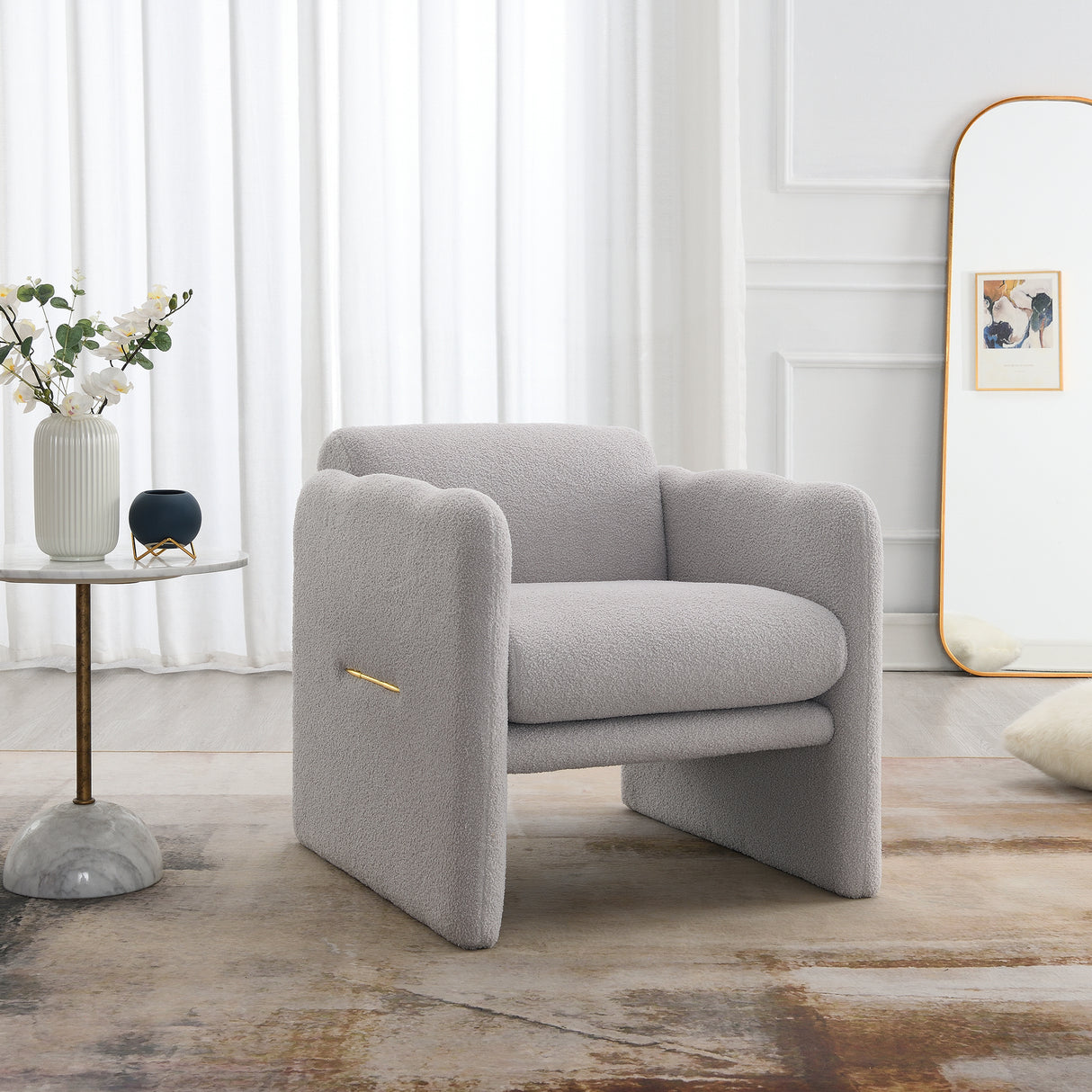 Armchair with wavy armrests, metal decorations on both sides of the armrests, made of Teddy cloth, light gray - Julia M LifeStyles