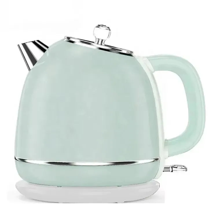 Mint green electric kettle with a white base on a white background