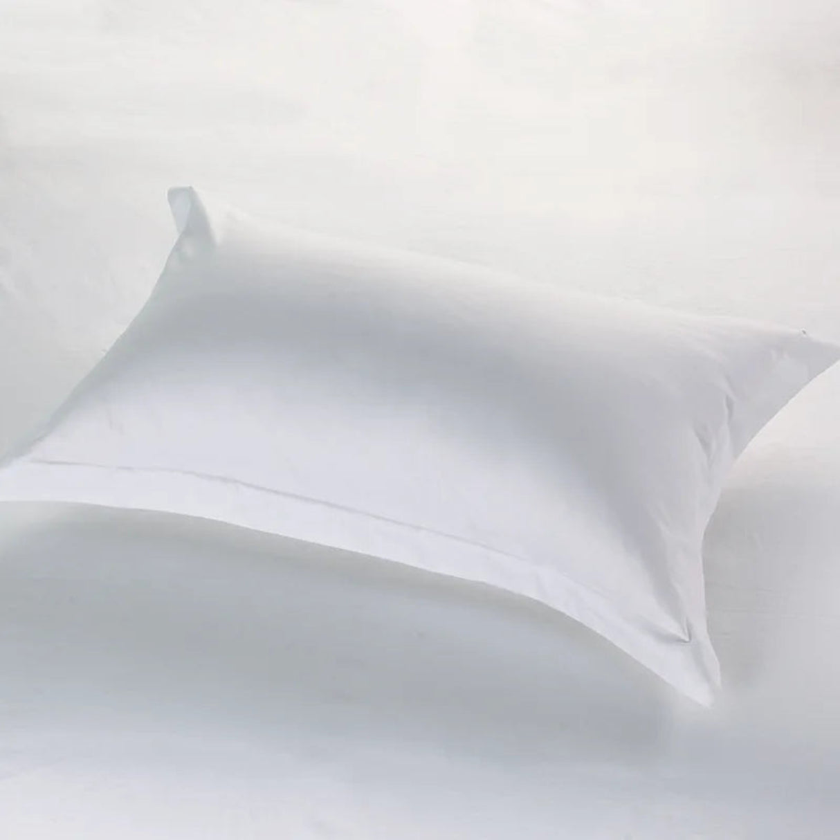 Close-up of a white pillow on a white background