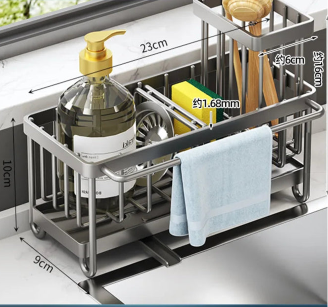 Kitchen sink organizer with utensils and soap, showing dimensions.