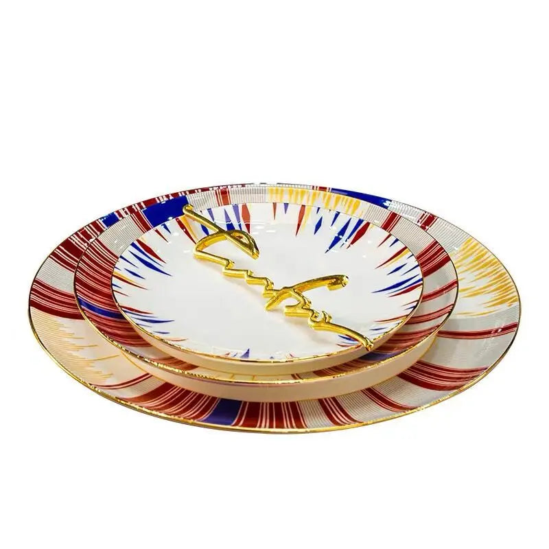 Set of colorful ceramic plates with a gold fox design on a white background