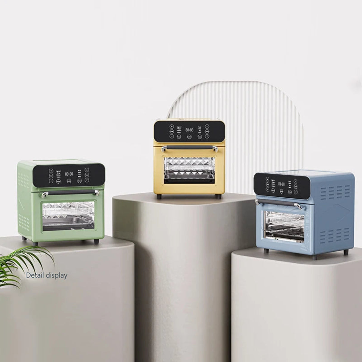 Three small ovens in green, gold, and blue on a white background