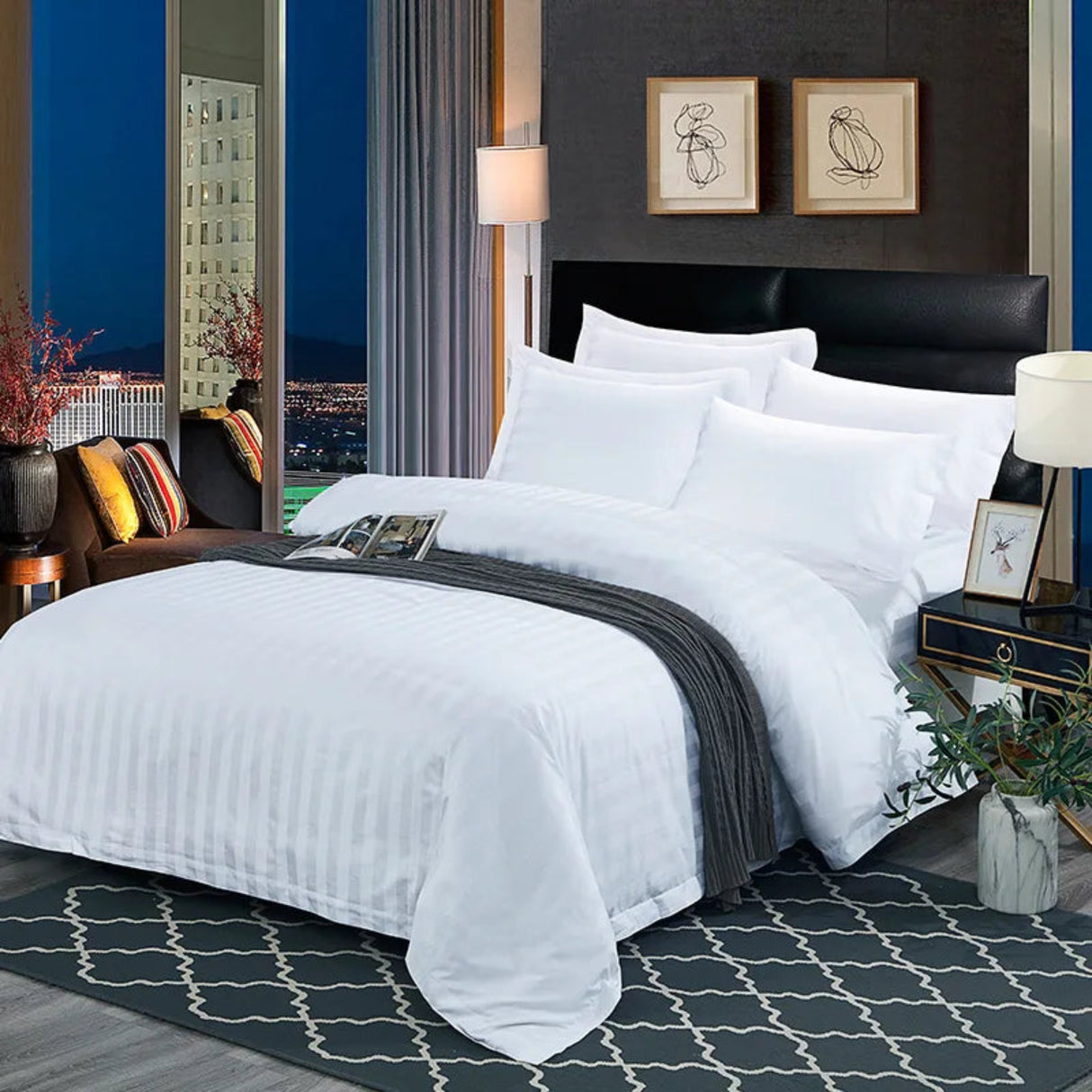 Neatly made bed with white bedding in a stylish bedroom.