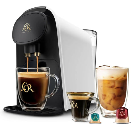 Coffee machine with coffee cups and a glass of iced coffee on a white background