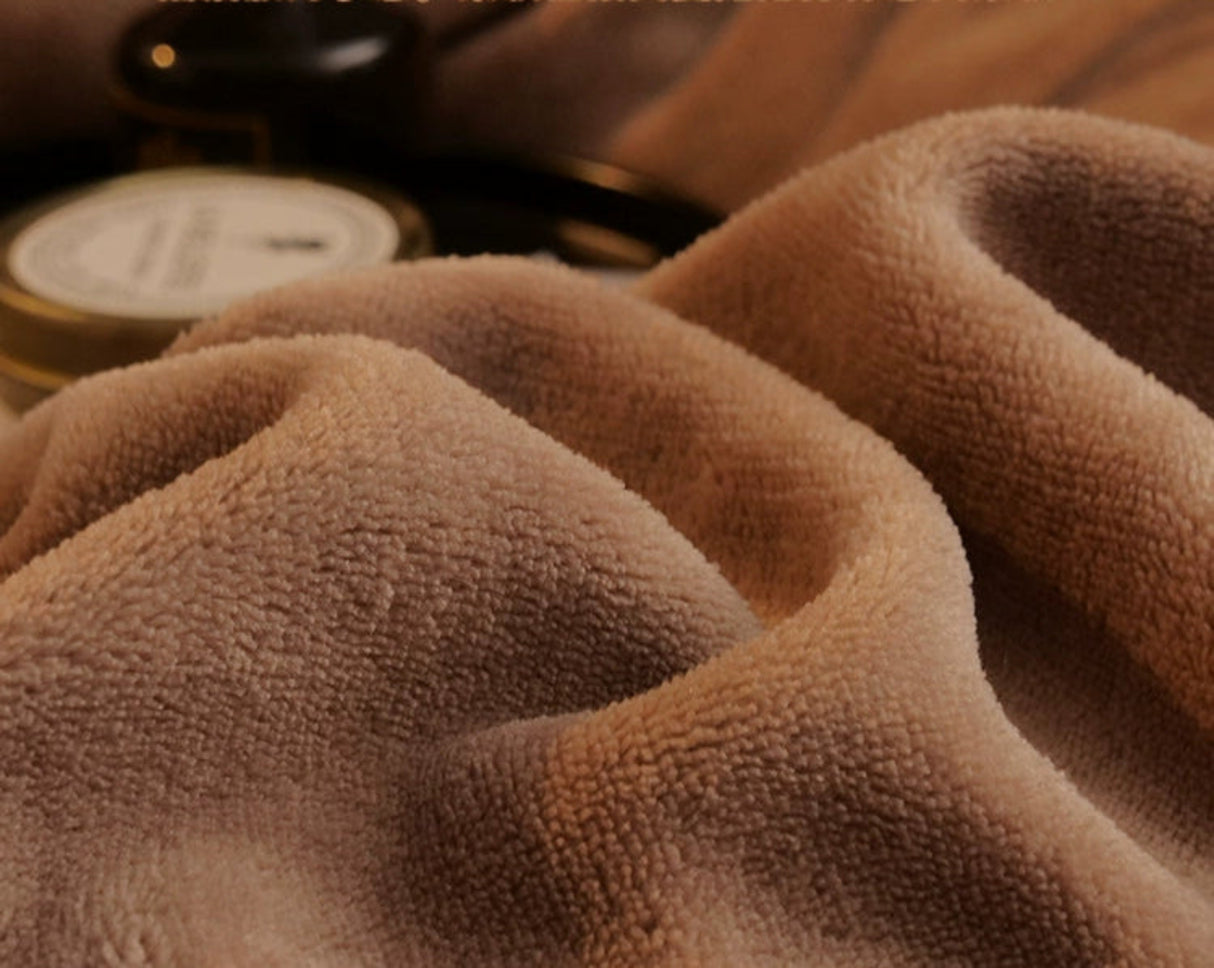Close-up of brown textured fabric with a blurred background