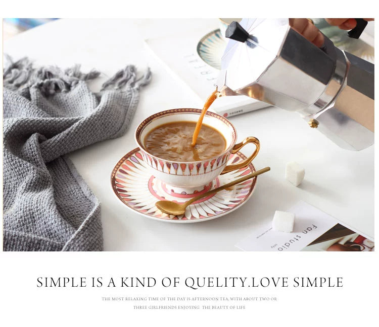 Coffee being poured into a decorative teacup with a spoon on a white surface, with text 'Simple is a kind of queliness. Love simple' at the bottom.