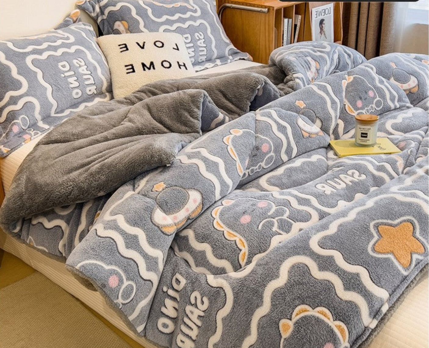 Flannel bedding set with cartoon designs on a bed, featuring the brand 'Rapid delivery'.