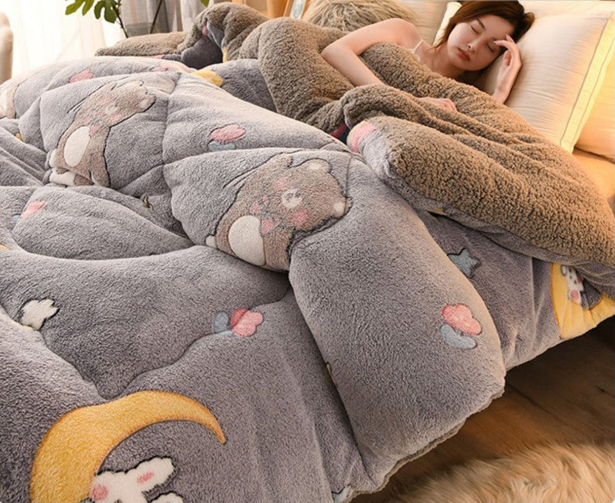Person lying on a bed under a gray cartoon-themed comforter with a 'Rapid delivery' label above.