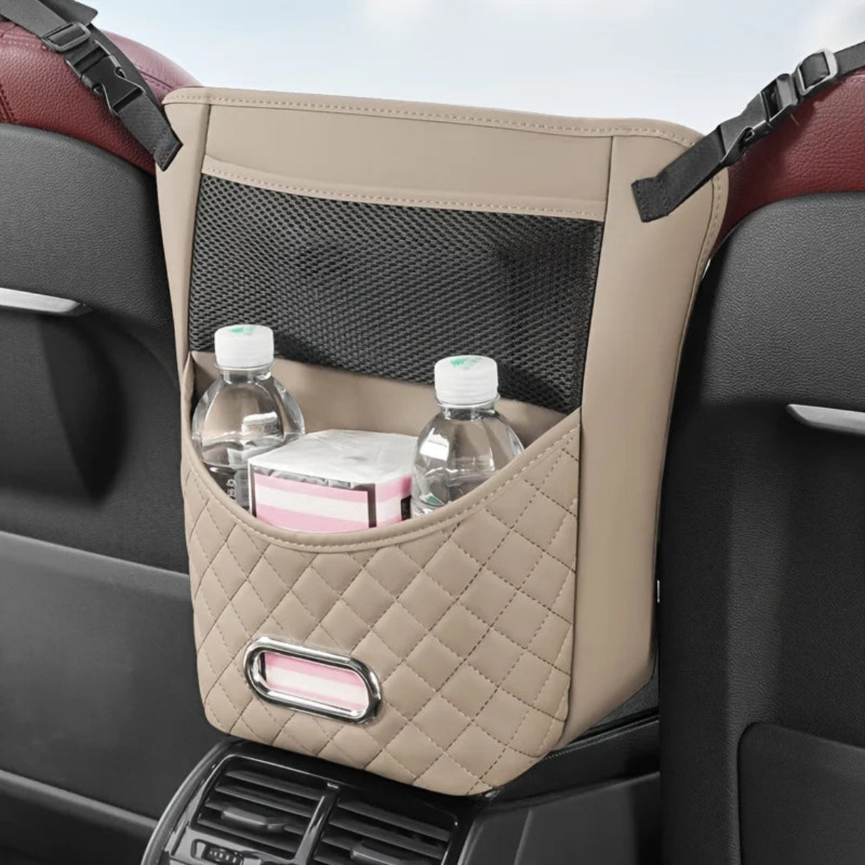 Car seat organizer with water bottles and a book inside, attached to a car seat.