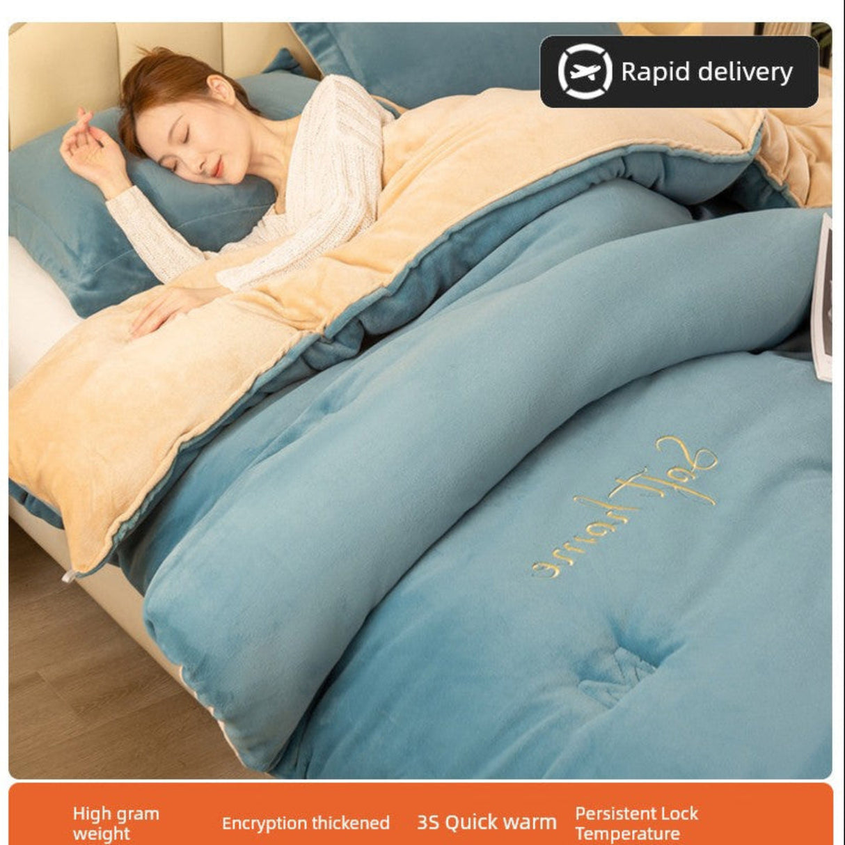 Woman sleeping under a blue comforter with 'Jelove' branding, on a bed with pillows.