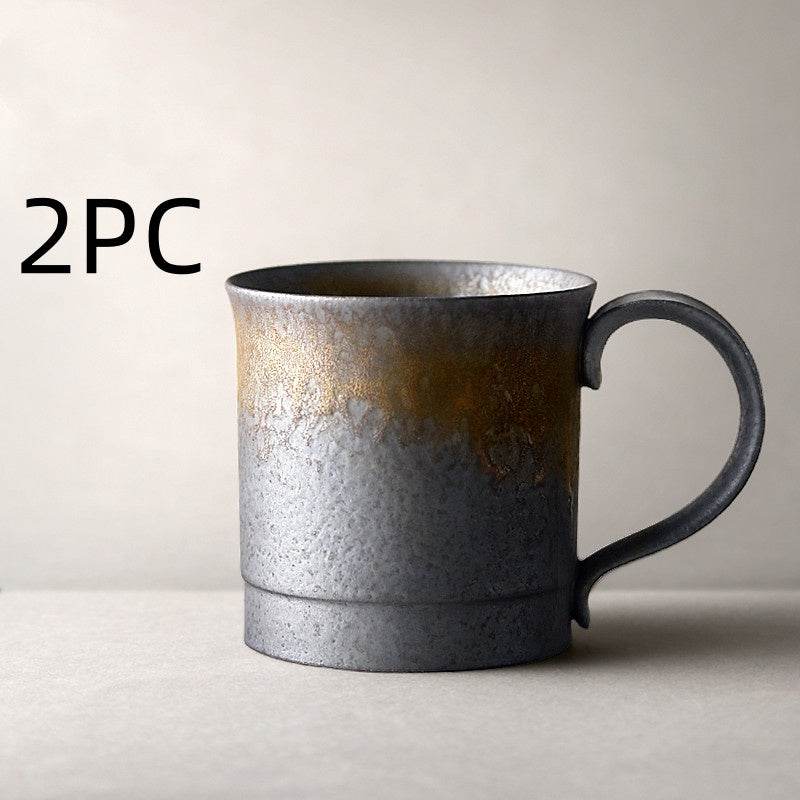 Vintage stoneware coffee cup made of pottery with rustic glaze and classic design