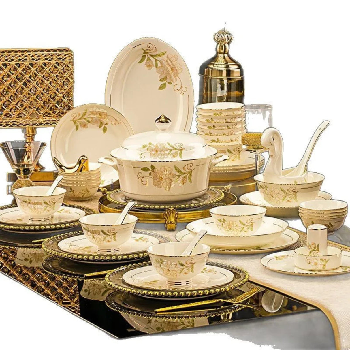 Dining set with gold and beige crockery on a white background