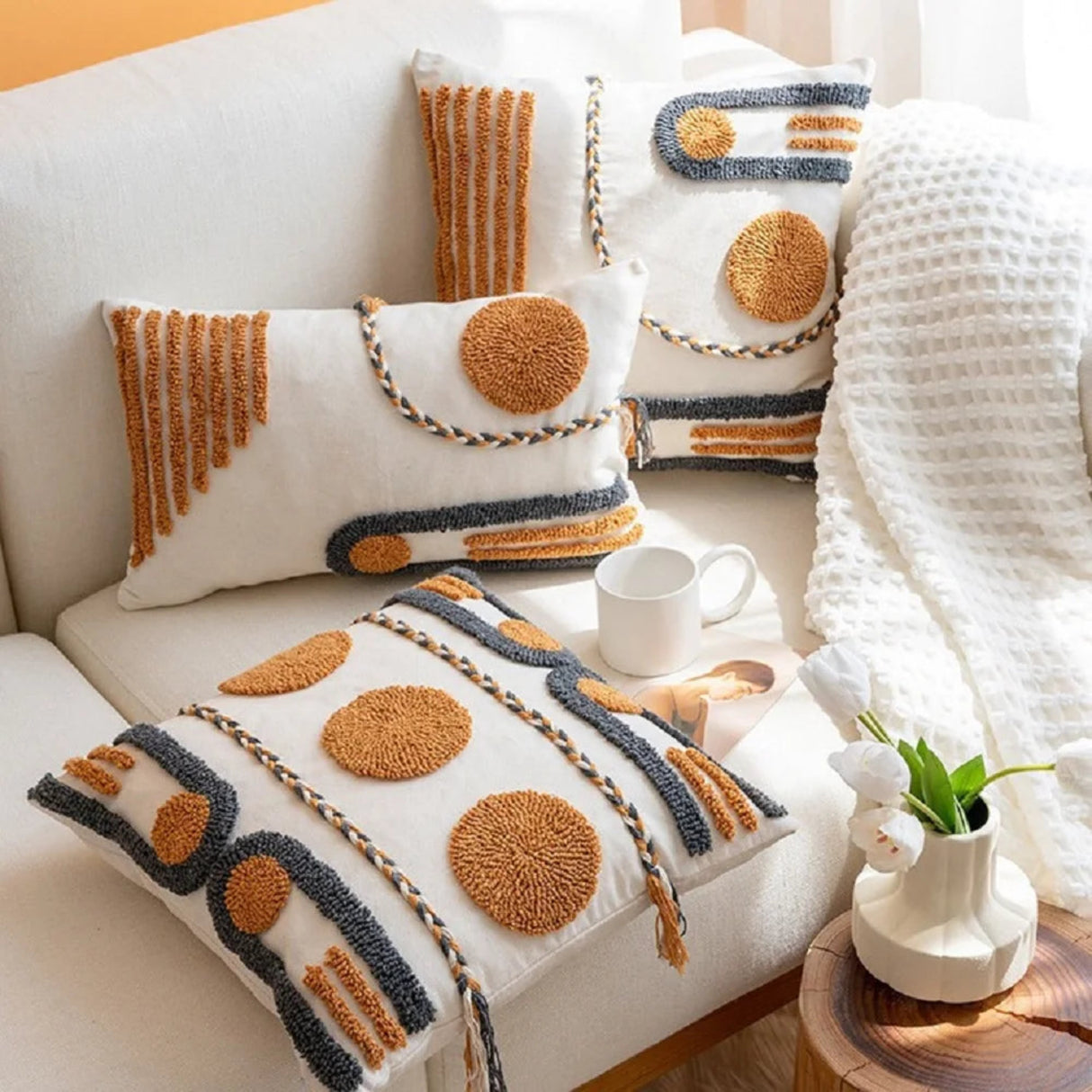 Decorative pillows with geometric patterns on a couch