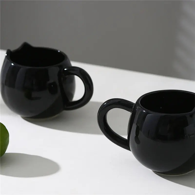 Adorable hand - painted cat - shaped ceramic mug, perfect for coffee or tea. - Julia M LifeStyles