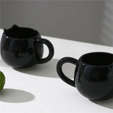 Adorable hand - painted cat - shaped ceramic mug, perfect for coffee or tea. - Julia M LifeStyles