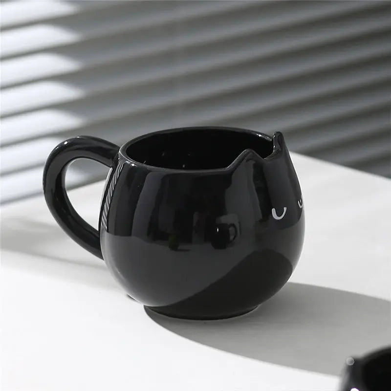 Adorable hand - painted cat - shaped ceramic mug, perfect for coffee or tea. - Julia M LifeStyles