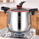 Stainless steel pressure cooker with '304' marking on a stove