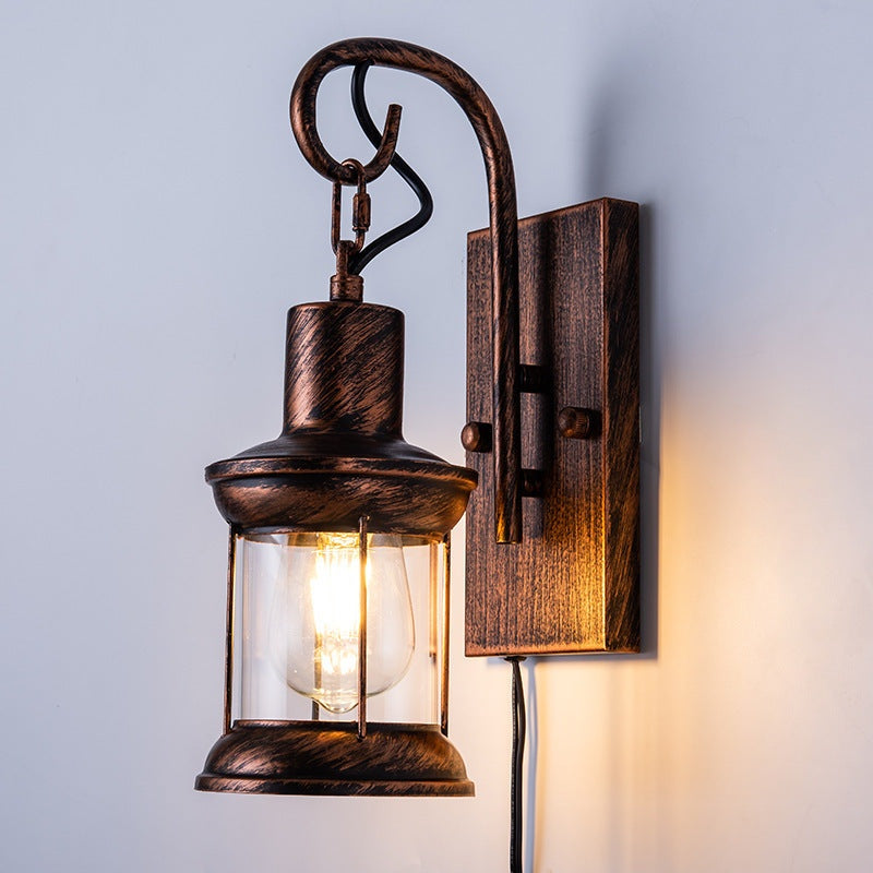 Astoria Vintage Wall Sconce with warm ambient lighting and vintage American design