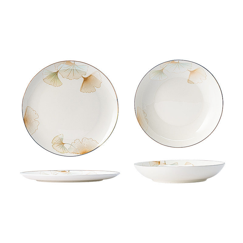 Set of ceramic plates with floral patterns on a white background