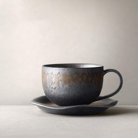 Vintage stoneware coffee cup made of pottery with rustic design