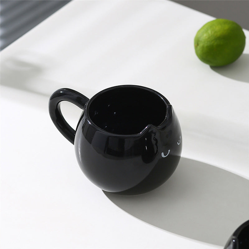 Adorable hand - painted cat - shaped ceramic mug, perfect for coffee or tea. - Julia M LifeStyles