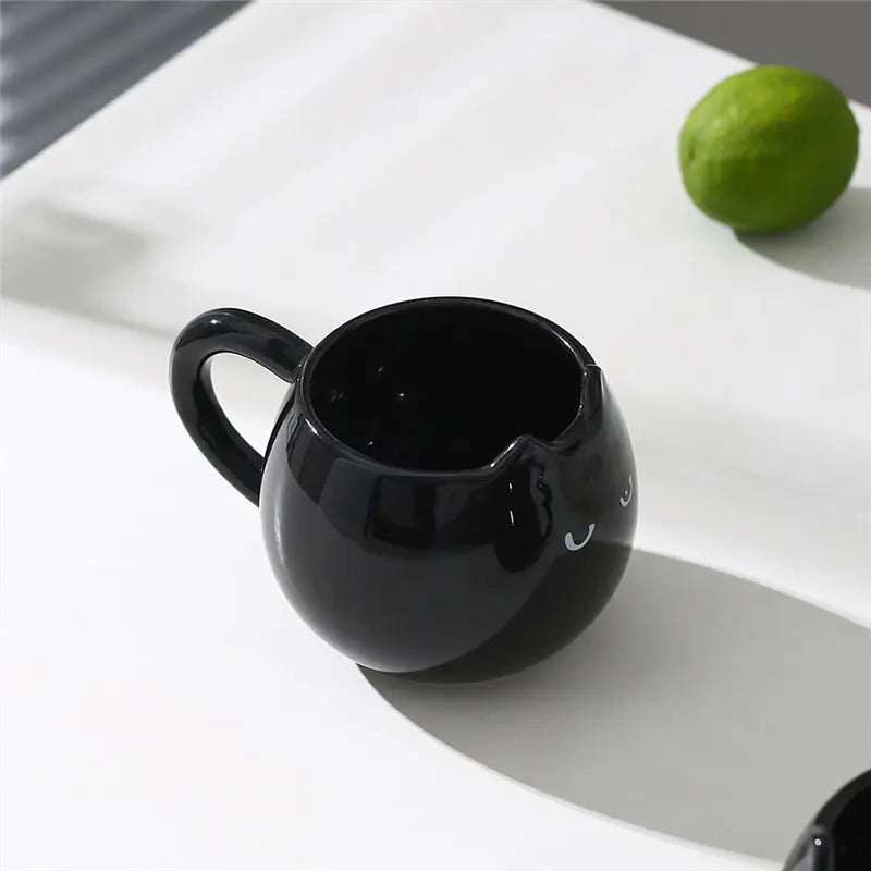 Adorable hand - painted cat - shaped ceramic mug, perfect for coffee or tea. - Julia M LifeStyles