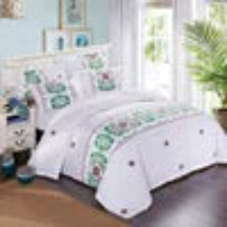 Bedroom with a bed, nightstands, and decorative pillows