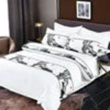 Bedding set with architectural floor plan design on a bed