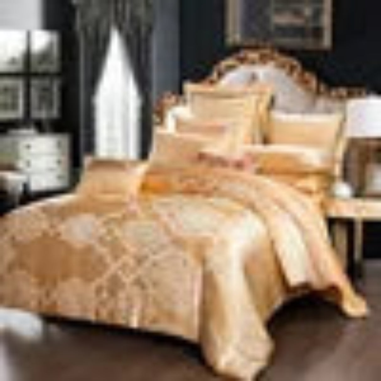 Bedding set with gold and white pattern on a bed