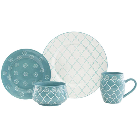 Teal and white patterned ceramic dinnerware set on a white background