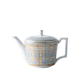 Teapot with geometric pattern on a white background