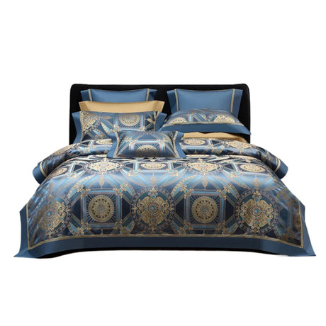 Blue and gold patterned bedding set on a bed with pillows and comforter.