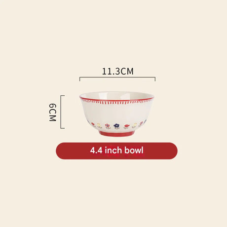 Measurement of a decorative bowl with floral patterns on a beige background
