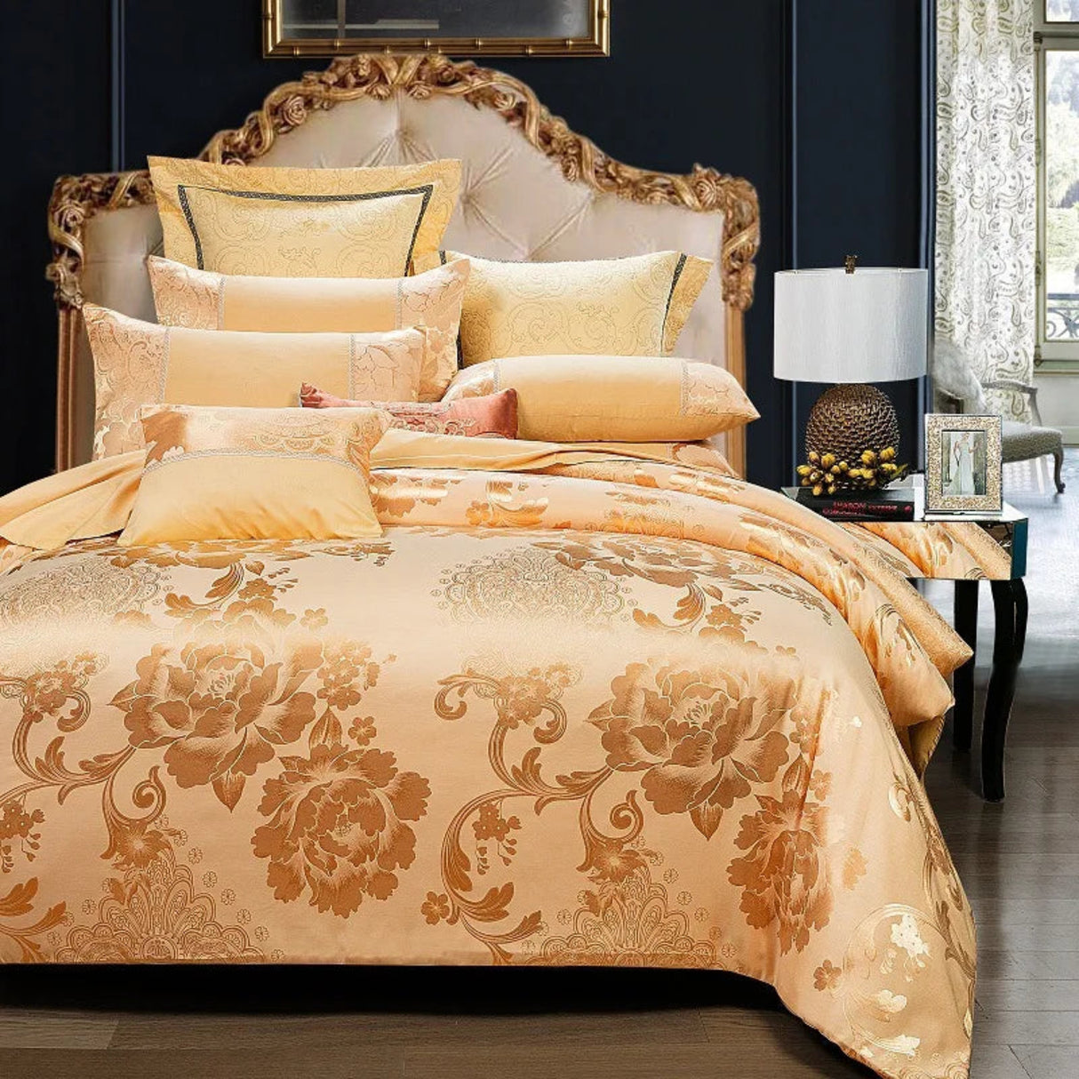 Luxurious bedroom with ornate bed and gold floral bedding