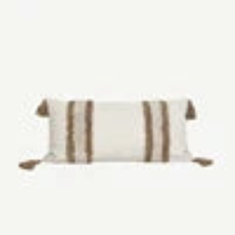 Striped pillow with a wooden button on a white background