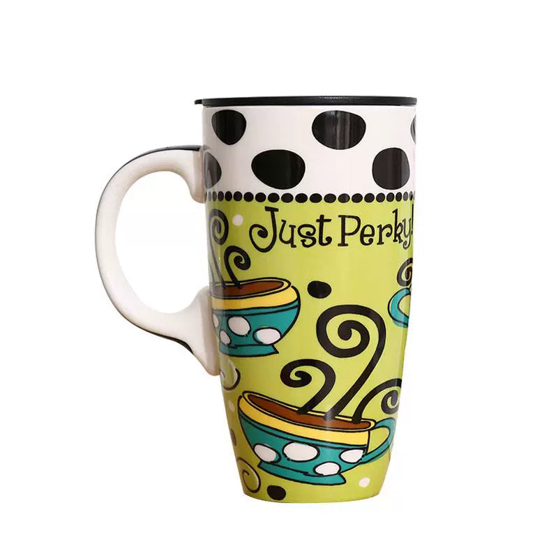 Colorful mug with polka dots and 'Just Perky' text on a white background