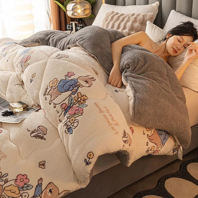 Woman lying on a bed with a floral-patterned blanket and pillow