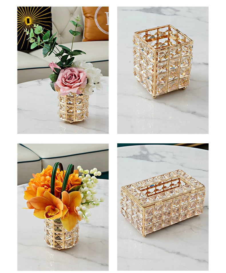 Decorative crystal baskets with flowers on a marble surface