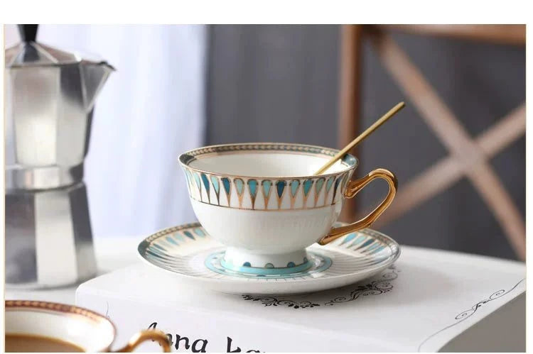 Ceramic cup with decorative patterns on a saucer, with a blurred background