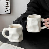 Ins Ceramic Asymmetrical Twist Coffee Mug – Elegant High-End Design