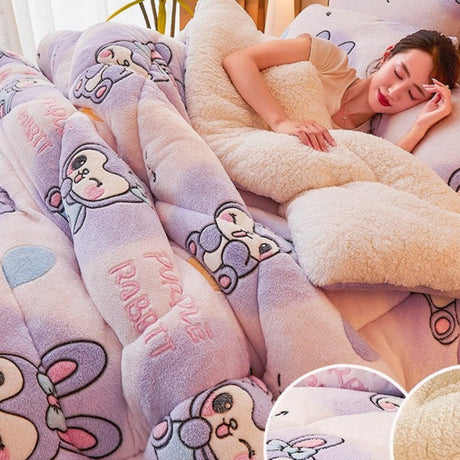 Person lying under a plush, cartoon-patterned blanket with a soft texture.
