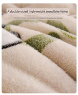 Close-up of a double-sided high-weight snowflake velvet fabric with green and beige pattern.