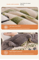 Textured blanket with soft waxy snow velvet and high weight cashmere features on a white background.