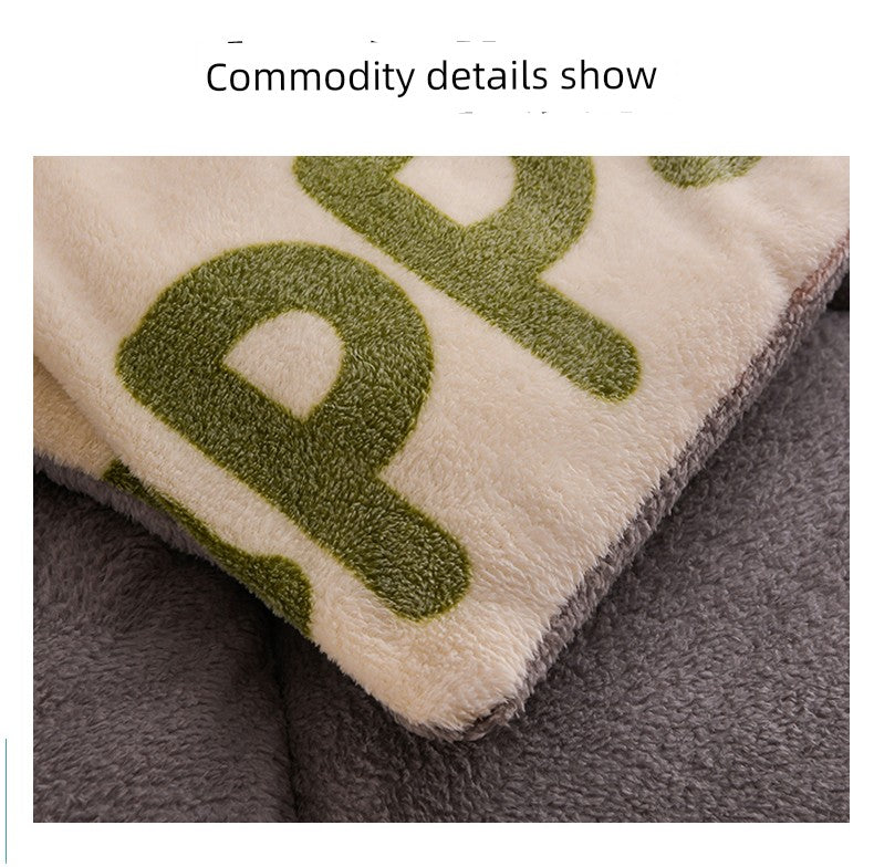 Close-up of a textured surface with green lettering on a white background